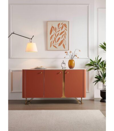 Orange leather sideboard with three doors and gold-finished metal legs