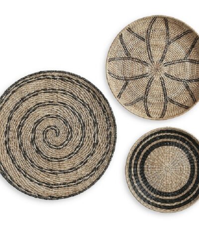Set of three round woven straw wall décor panels with charcoal geometric patterns