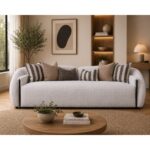 Warm Ivory bouclé 4 seater sofa with black metal leg accents and striped scatter cushions — view 2