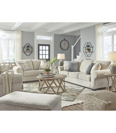Warm oatmeal fabric sofa set with rolled arms and patterned scatter cushions