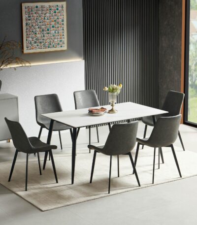 White marble-look rectangular dining table with six grey PU leather chairs on black metal legs