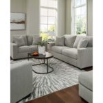 Pearl ribbed fabric sofa set with sofa and two loveseats in a living room