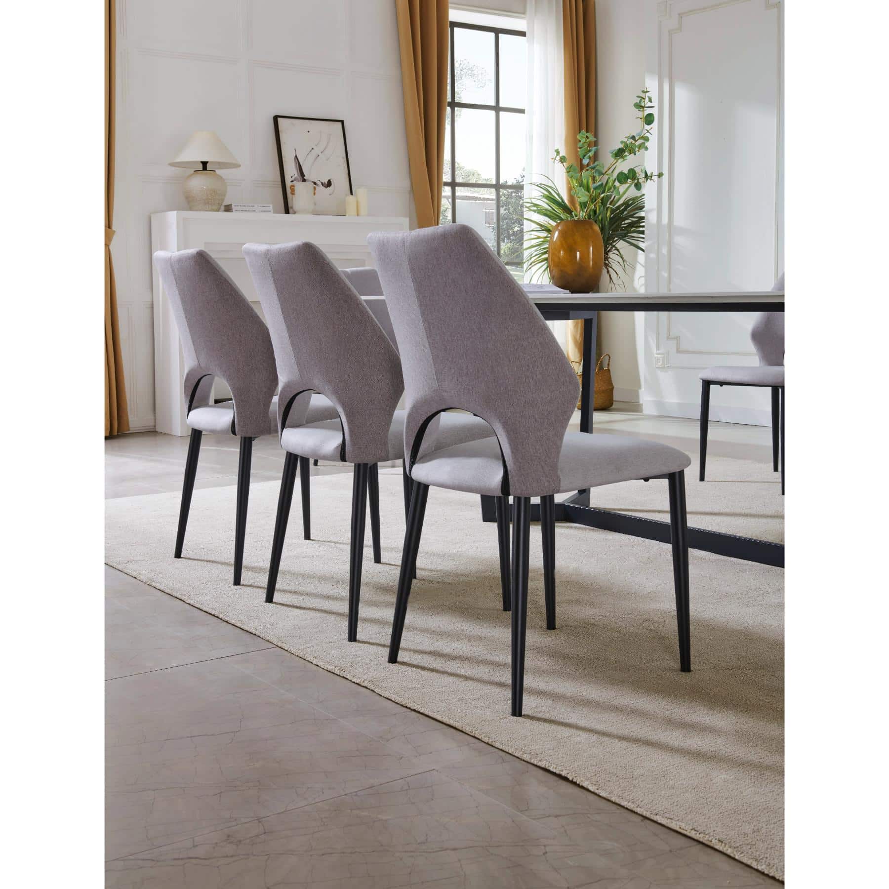 48-30-00261-11.jpg Rectangular sintered stone dining table with matte black base and grey upholstered chairs — view 8