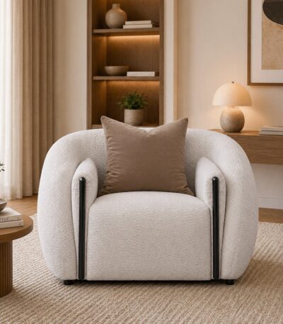 Warm Ivory bouclé sofa chair with rounded arms and black metal leg accents