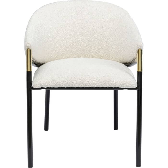 Warm ivory boucle dining chair with black steel frame and brass armrest accents