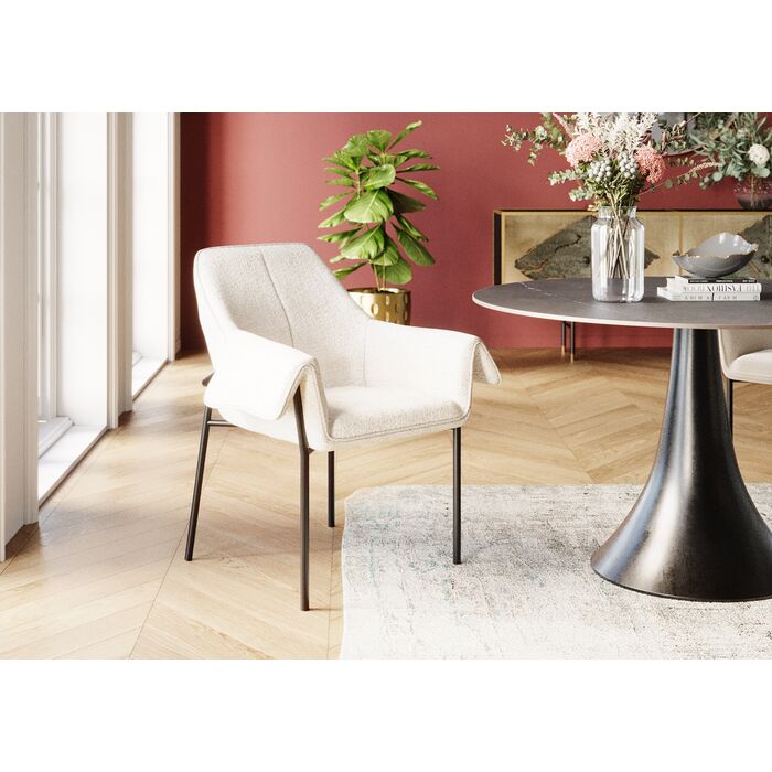 Cream boucle dining chair with armrests and matte black steel legs