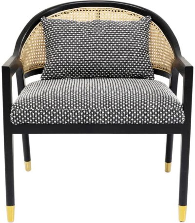 Charcoal grey dot-weave accent chair with woven cane back and brass-capped legs