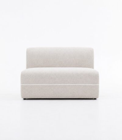 Warm beige chenille fabric armless chair with ivory piping accent
