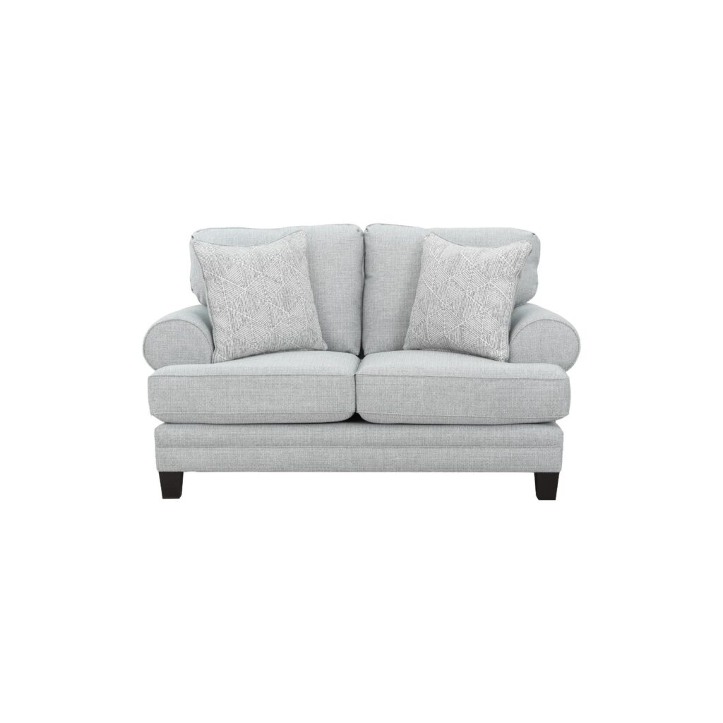 Pale grey fabric 2 seater loveseat with rolled arms and geometric scatter cushions