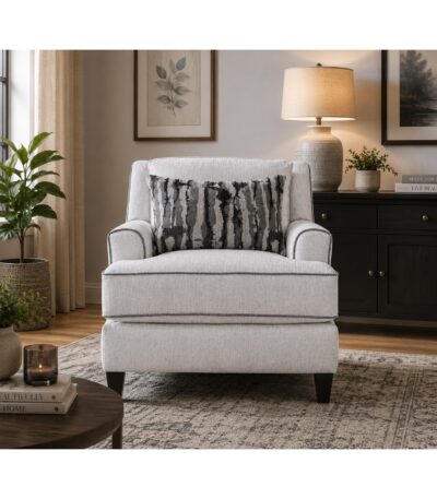 Warm oatmeal fabric sofa chair with charcoal piping and striped scatter cushion