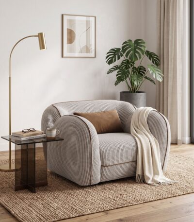 Warm oatmeal fabric sofa chair with rolled arms and rust-brown scatter cushion