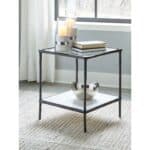 Black metal side table with clear glass top and marble-look lower shelf