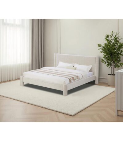 Warm Oatmeal upholstered King bed with curved wingback headboard and bolster legs