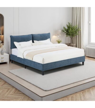 Blue fabric king bed with pillow-style headboard and slatted base