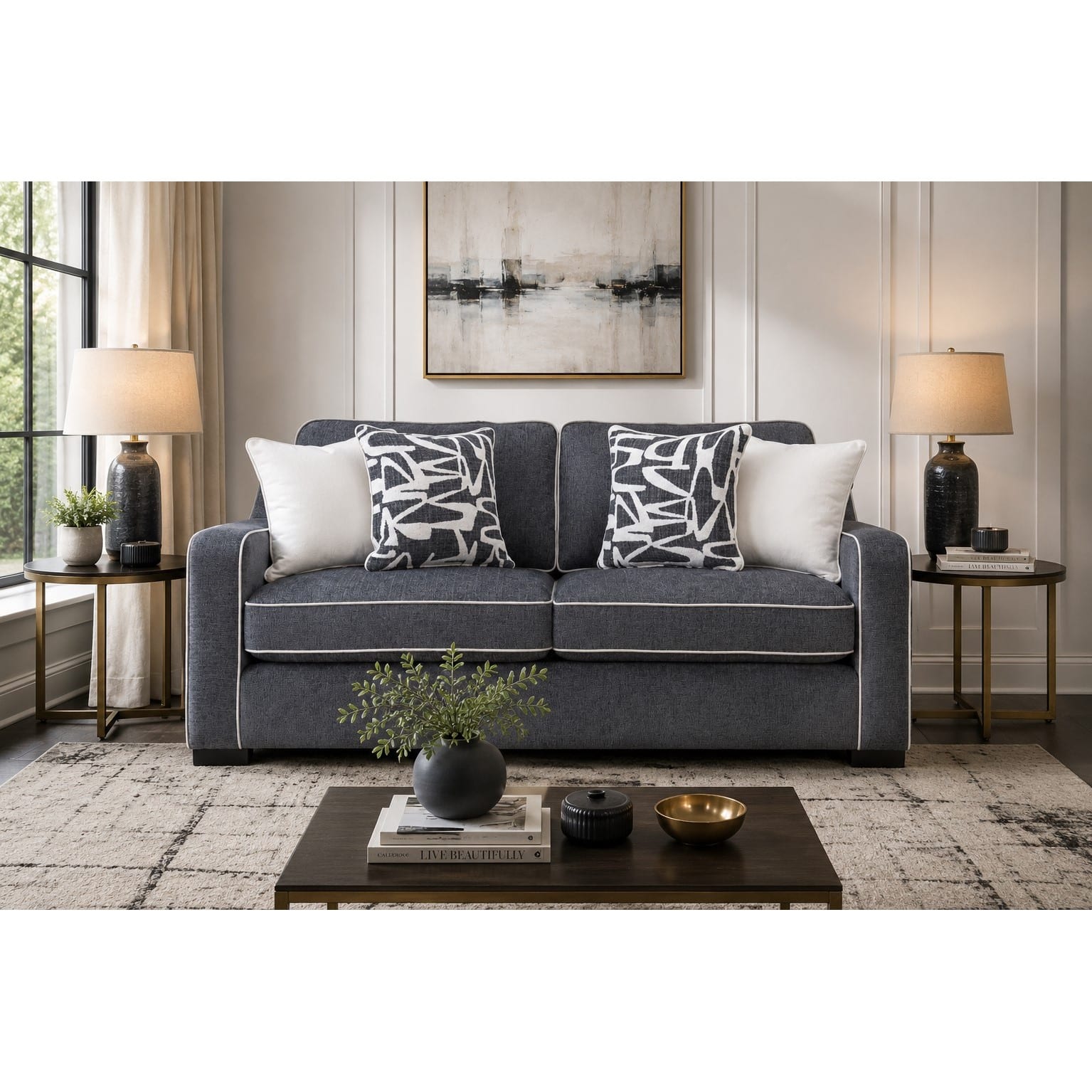 23-30-00082-2.jpg Charcoal grey chenille two seater sofa with white piping and patterned scatter cushions