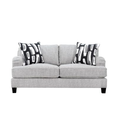 Warm ivory fabric loveseat with rolled arms and black and white patterned scatter cushions