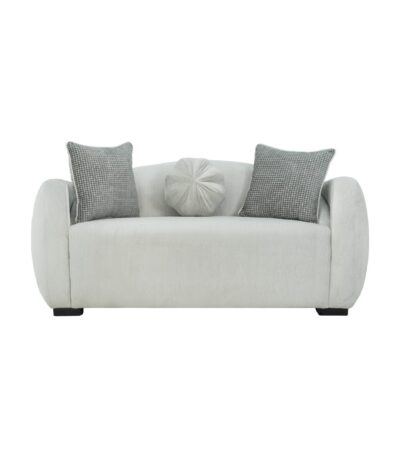 Warm ivory velvet 2 seater loveseat with rounded bolster arms and dove grey scatter cushions