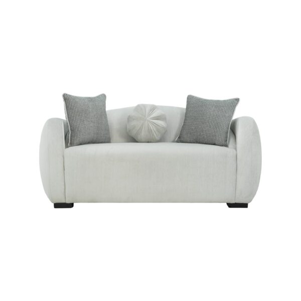 Warm ivory velvet 2 seater loveseat with rounded bolster arms and dove grey scatter cushions