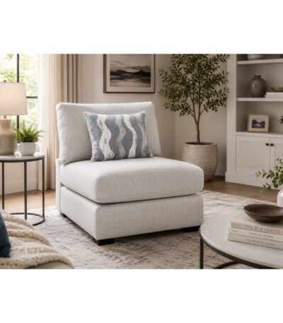 Light grey fabric armless sofa chair with steel blue wave-pattern scatter cushion
