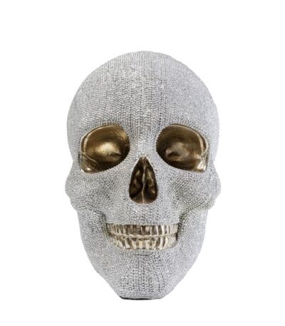 Silver rhinestone-textured resin skull ornament with gold eye sockets and coin slot
