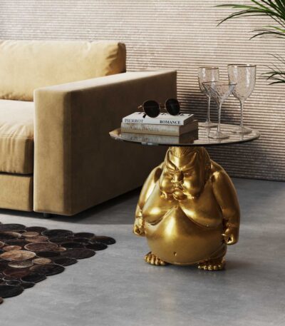 Gold sculptural sumo figure side table with round glass top
