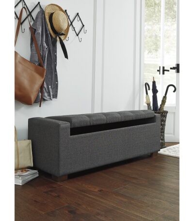 Charcoal grey upholstered storage bench with tufted top and lift-up lid