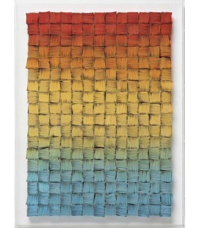 Woven textured wall art panel in terracotta ochre and blue with acrylic box frame