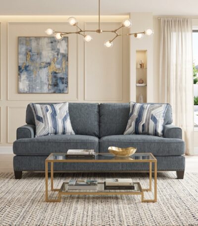 Slate blue chenille fabric loveseat with track arms and nailhead trim