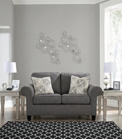 Charcoal grey chenille loveseat with rolled arms and patterned scatter cushions — view 4