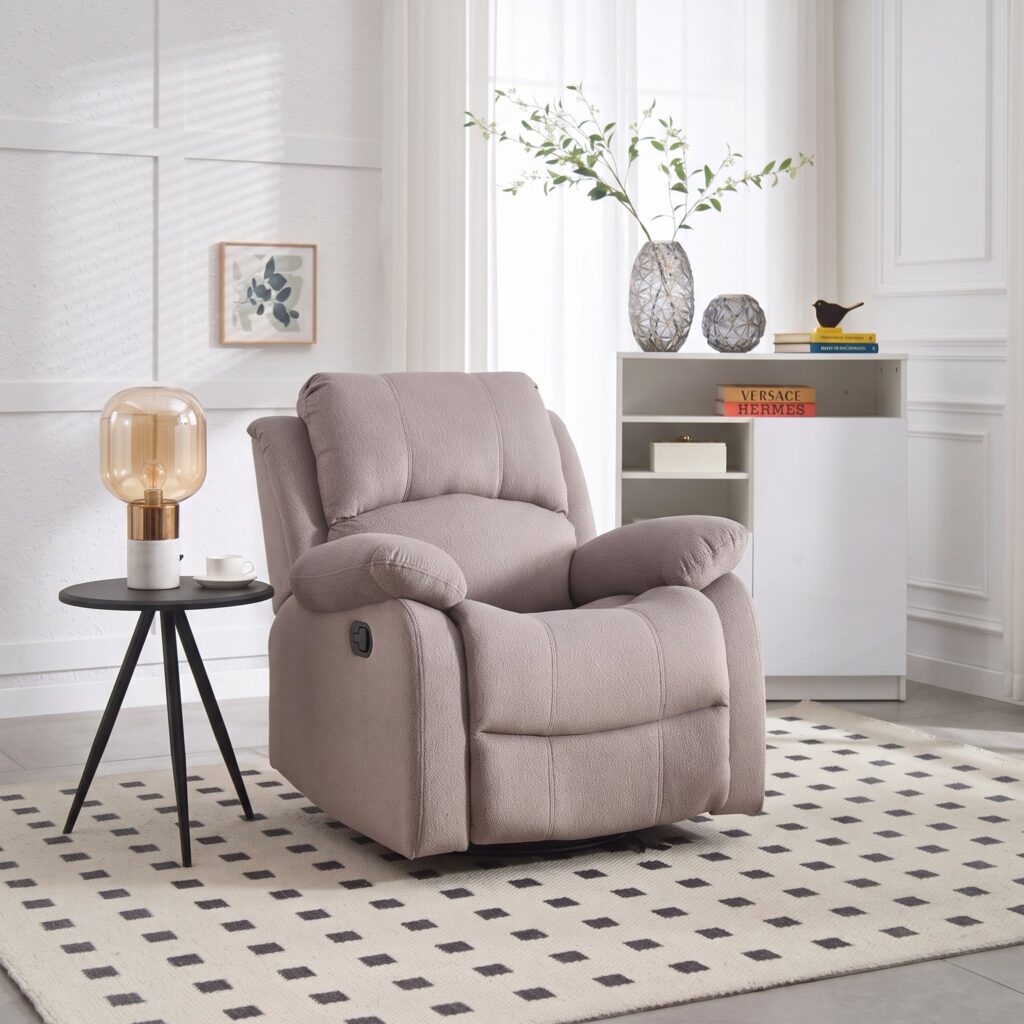 Warm taupe fabric swivel rocker recliner with pillow-top arms and manual recline lever