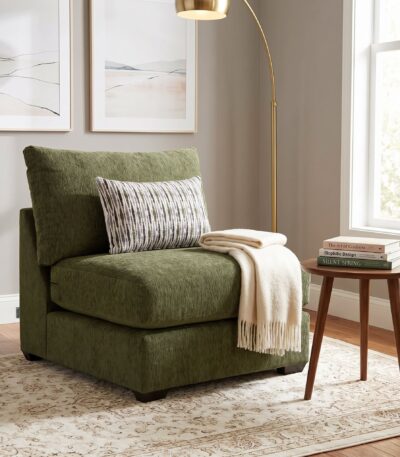 Olive green chenille armless chair with striped scatter cushion