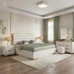 Ivory upholstered Super King bed with gold-trimmed lift-up storage base and matching nightstand