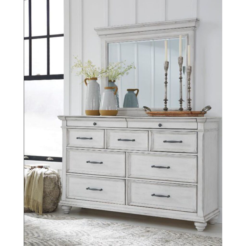 White distressed wood dresser with mirror and seven drawers