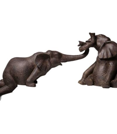 Set of two brown resin elephant figurines with textured, hand-carved detail
