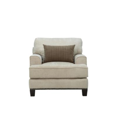 Warm oatmeal chenille sofa chair with nailhead trim and striped scatter cushion