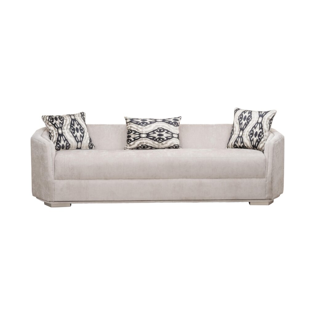 Warm ivory chenille 4 seater sofa with ikat scatter cushions and block feet