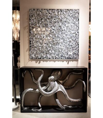 Silver octopus sculpture console table on a black metal frame with lower shelf