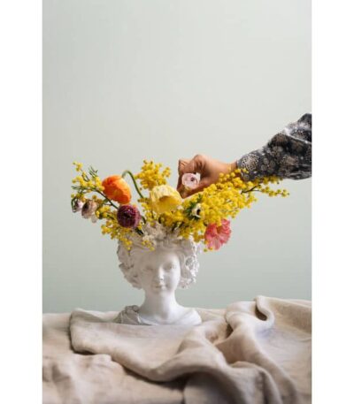 White resin bust vase with coral and shell detail on crown